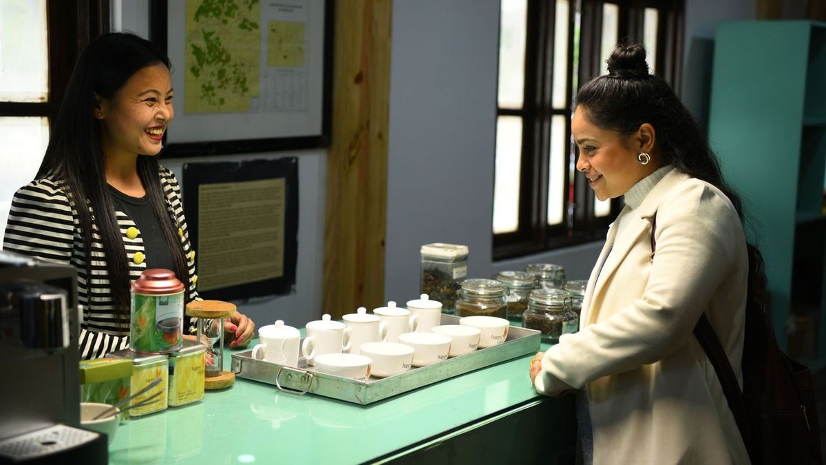 After plucking tea leaves with the women at the Happy Valley Tea Estate, the 'Shonar Bengal' host participates in a tea tasting session.